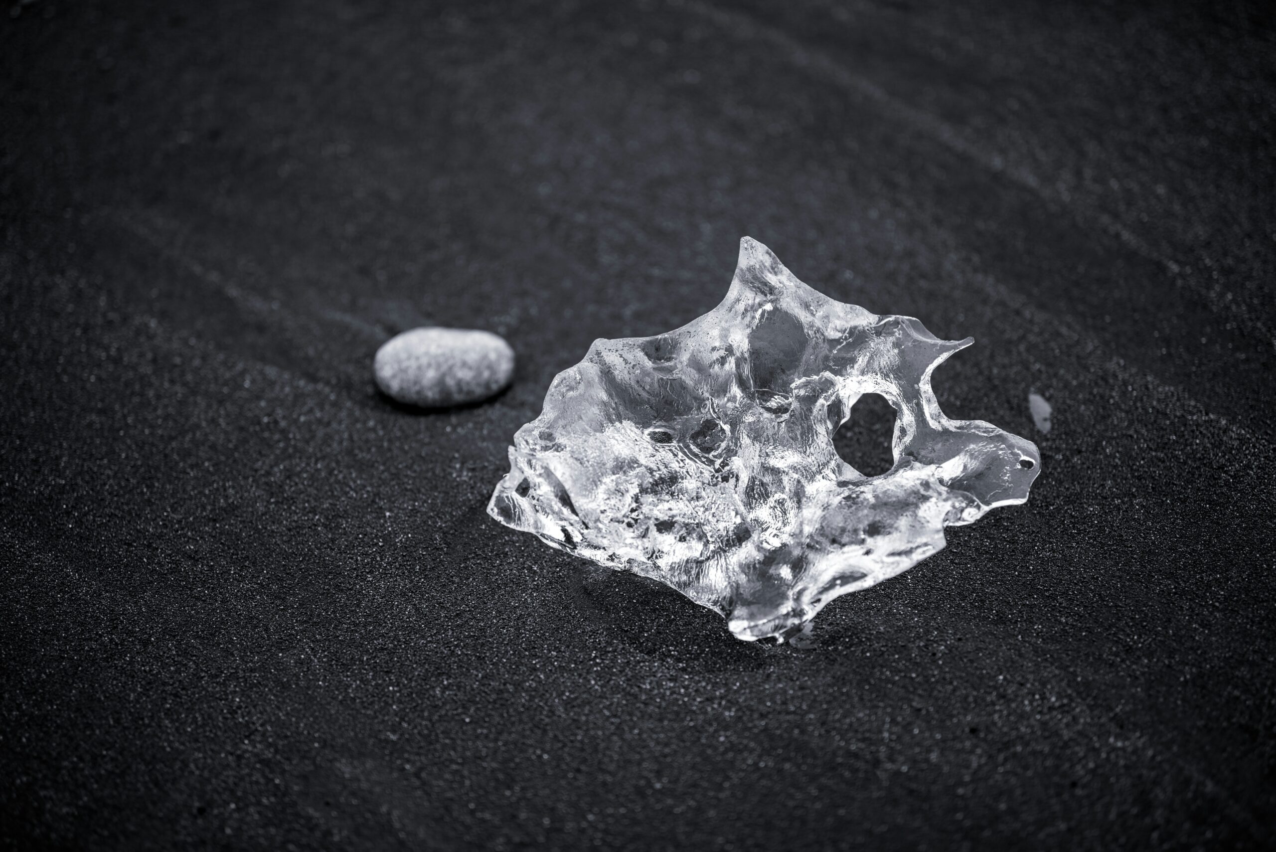 A photo of broken shards from improperly stored glass toys scattered across a table.