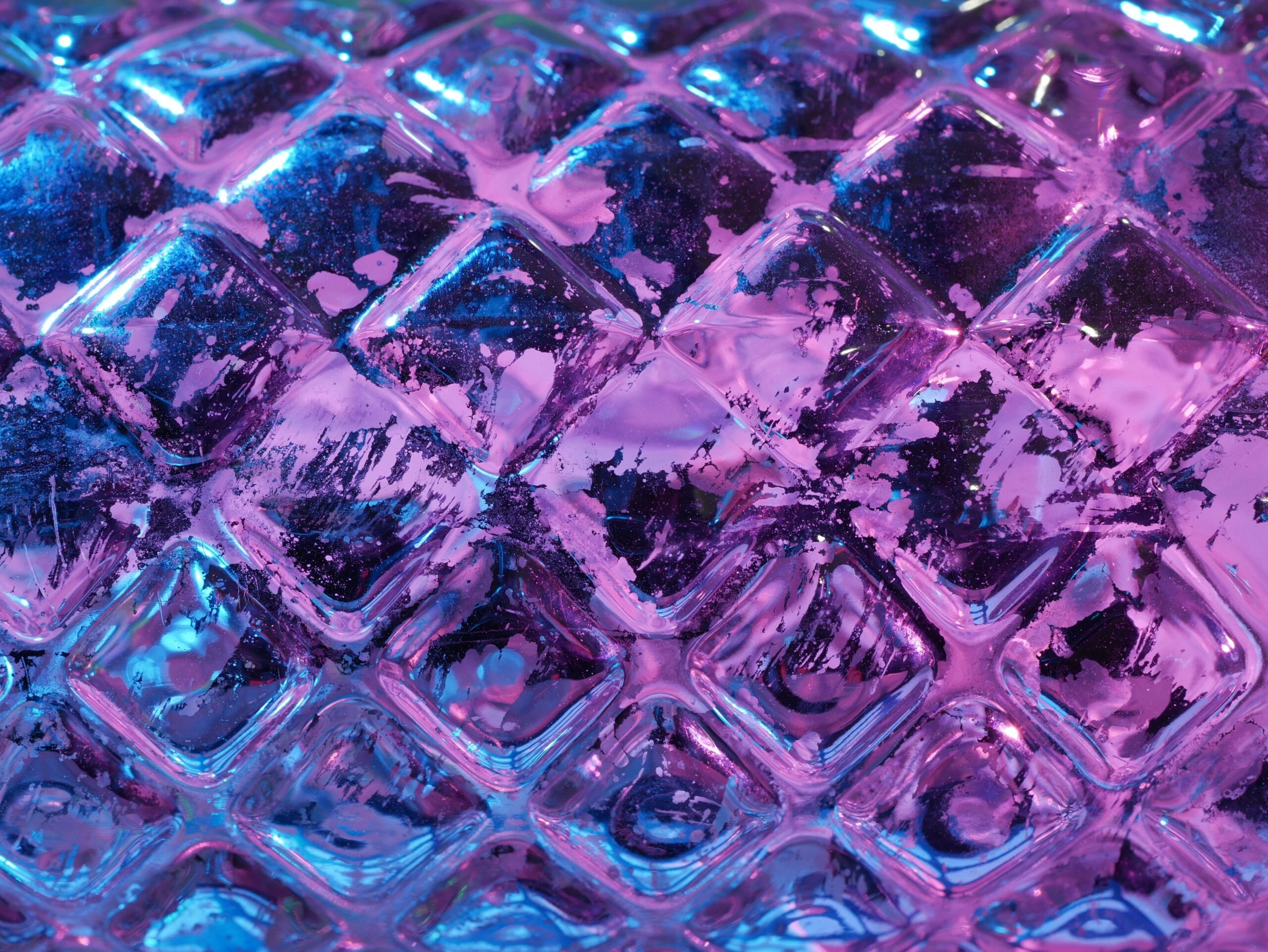 Close-up image showcasing different textures of glass toys suitable for pets