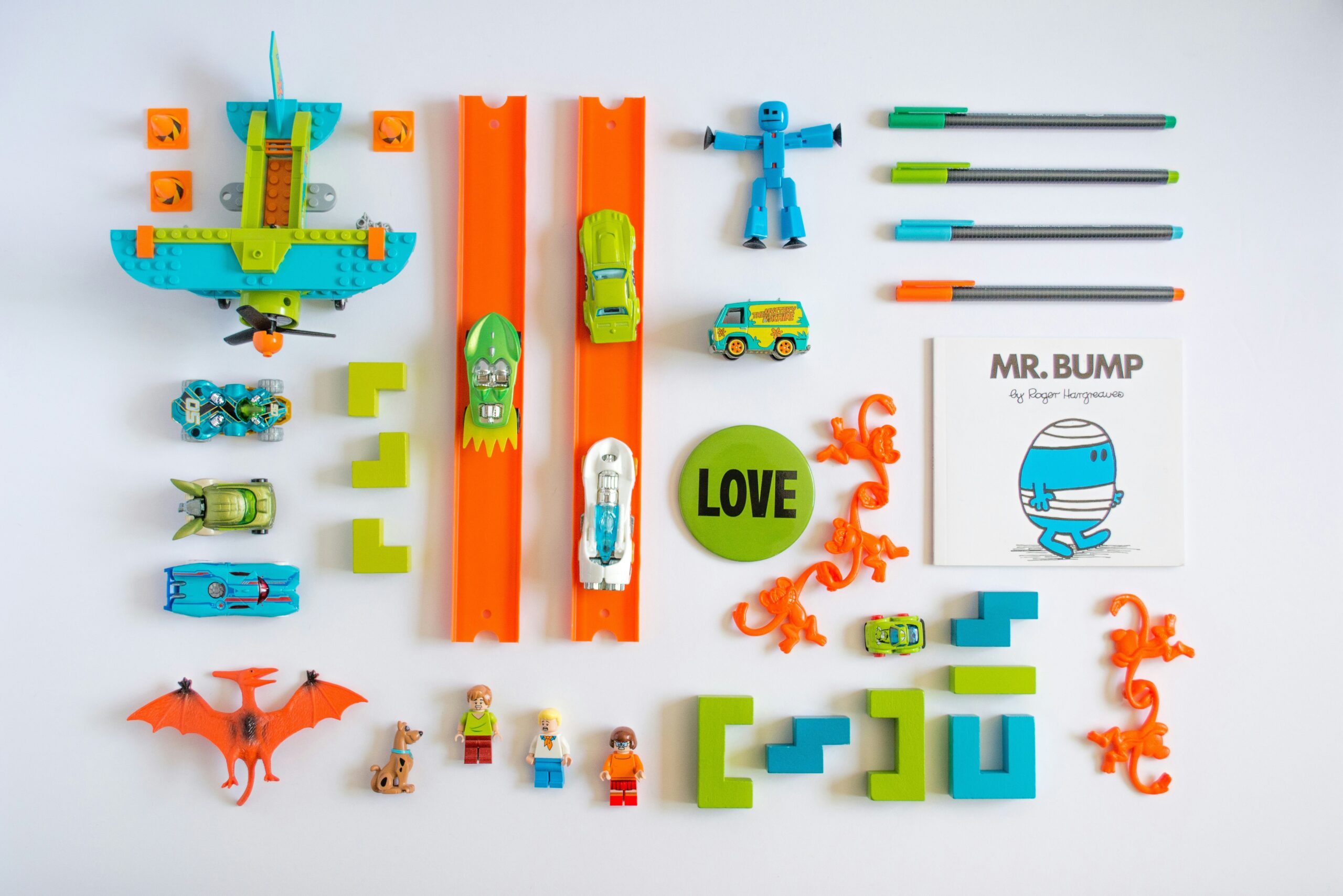 Glass pet toys neatly arranged on a clean shelf