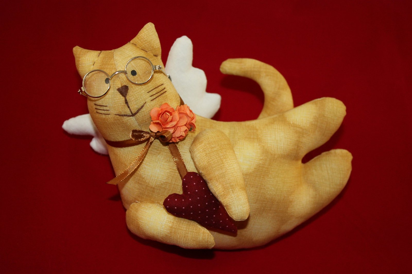 A beautifully crafted blue glass toy shaped like a fish