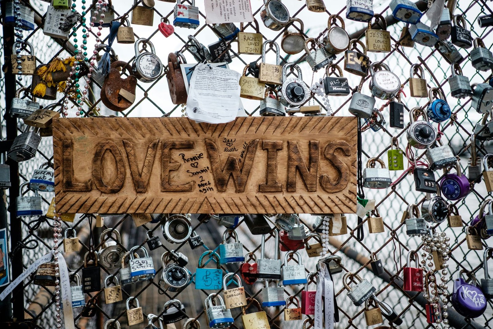 Golden retriever playing with a durable glass ball outdoors